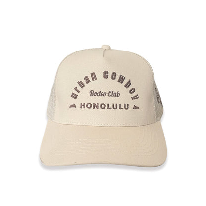 Beige cap with text on a white background