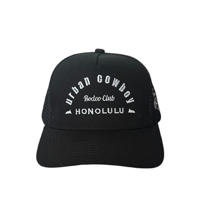 Urban Cowboy Co. black mid-profile snapback hat with white embroidered text and breathable mesh back panel